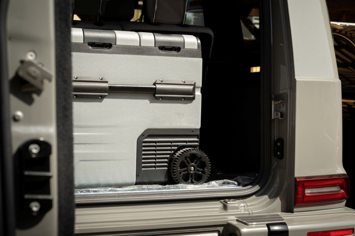 Cooler with Wheels Inside the Open Back of A Silver Suv — MAE Refrigeration In Palm Cove, QLD