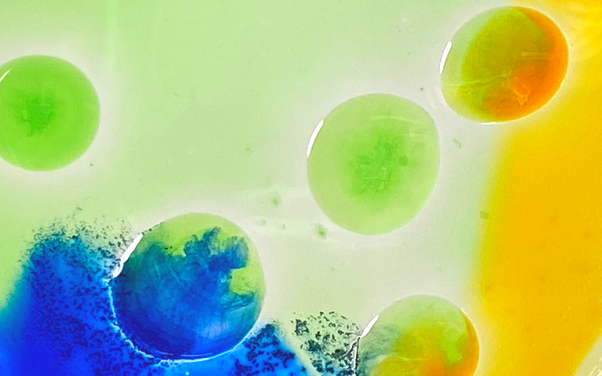 Deloitte logo above a circular abstract design of pink and blue ink swirls, with text: 