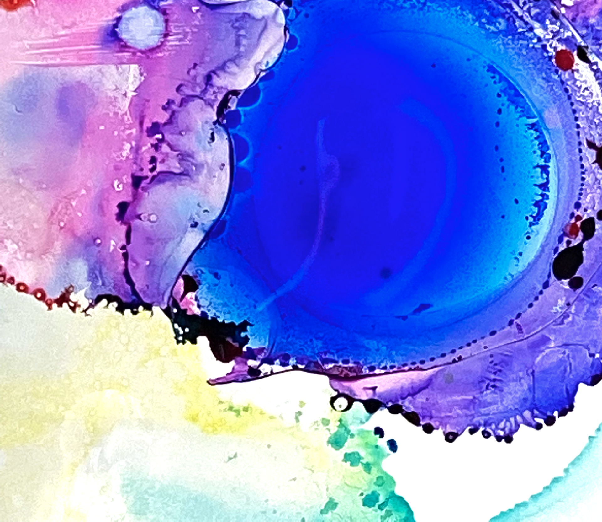 Abstract alcohol ink painting featuring a deep blue circular center surrounded by vibrant purple, pink, and yellow washes.