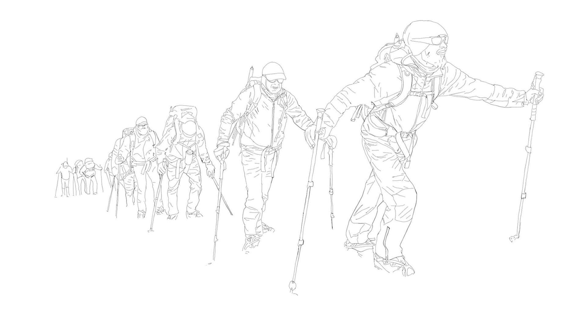 A line of hikers with backpacks and trekking poles walking uphill in a snowy, mountainous landscape.