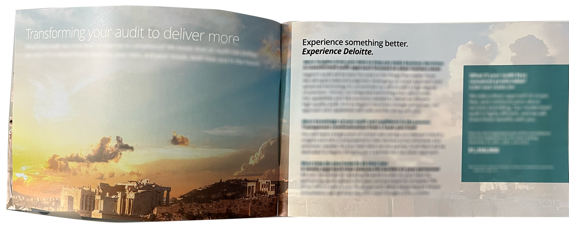 Open book showing a digital illustration of a sunset over ruins on the left and informative text on the right page.