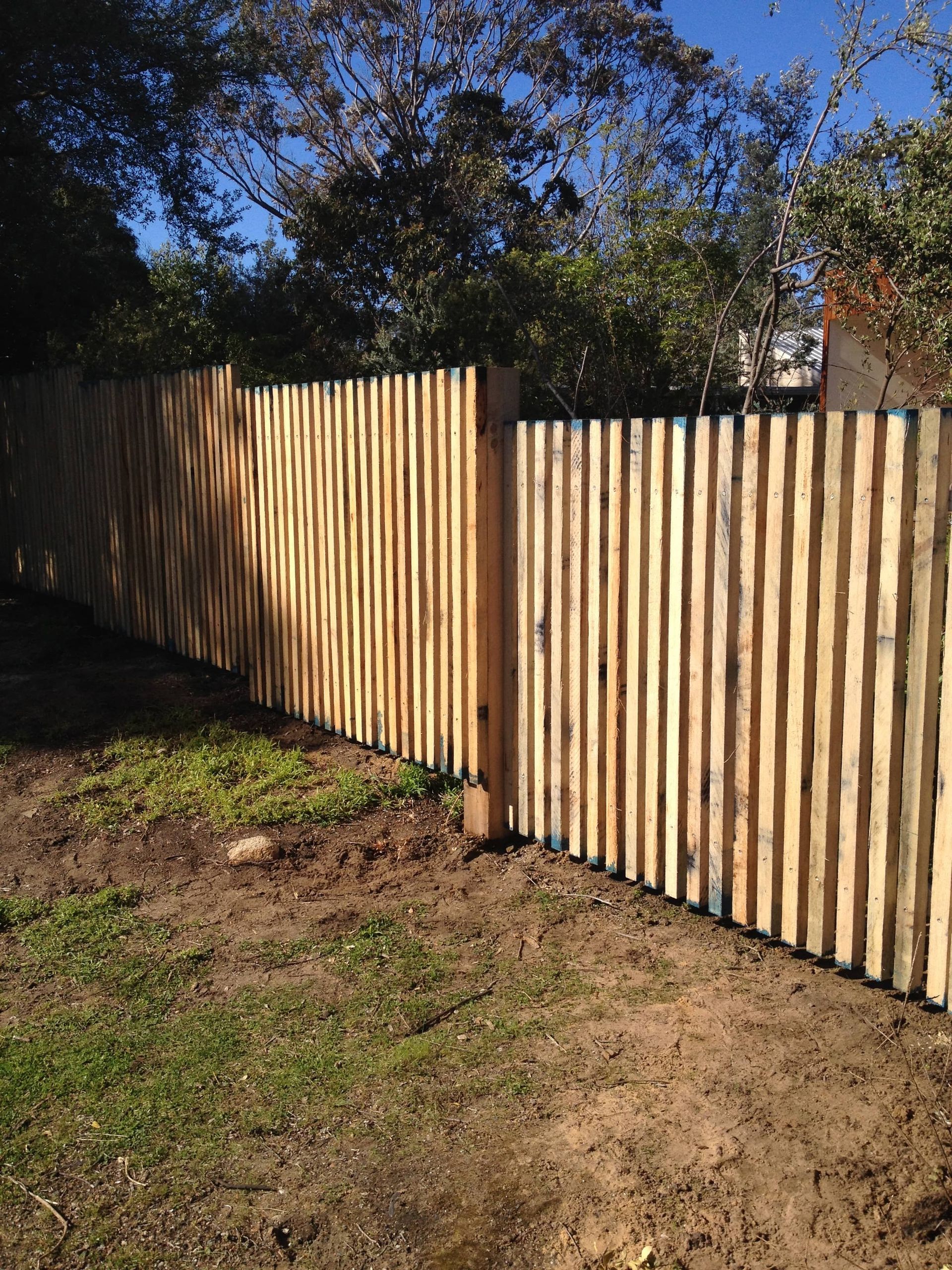 A wooden fence is sitting in the middle of a grassy field — Aztech Fencing In Upsalls Creek, NSW