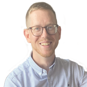 A man wearing glasses and a striped shirt is smiling