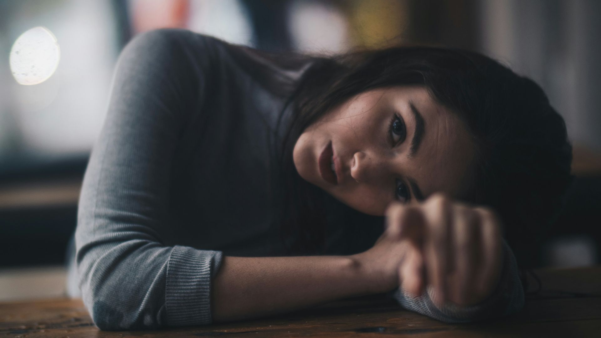 Woman with depression resting her head feeling ready to try counselling in Barrie