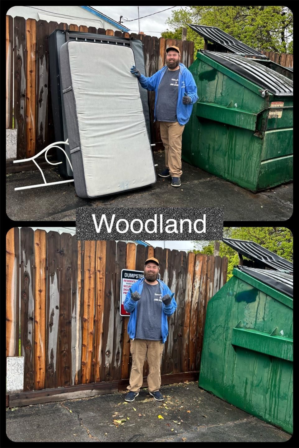A man is standing next to a dumpster holding a mattress.