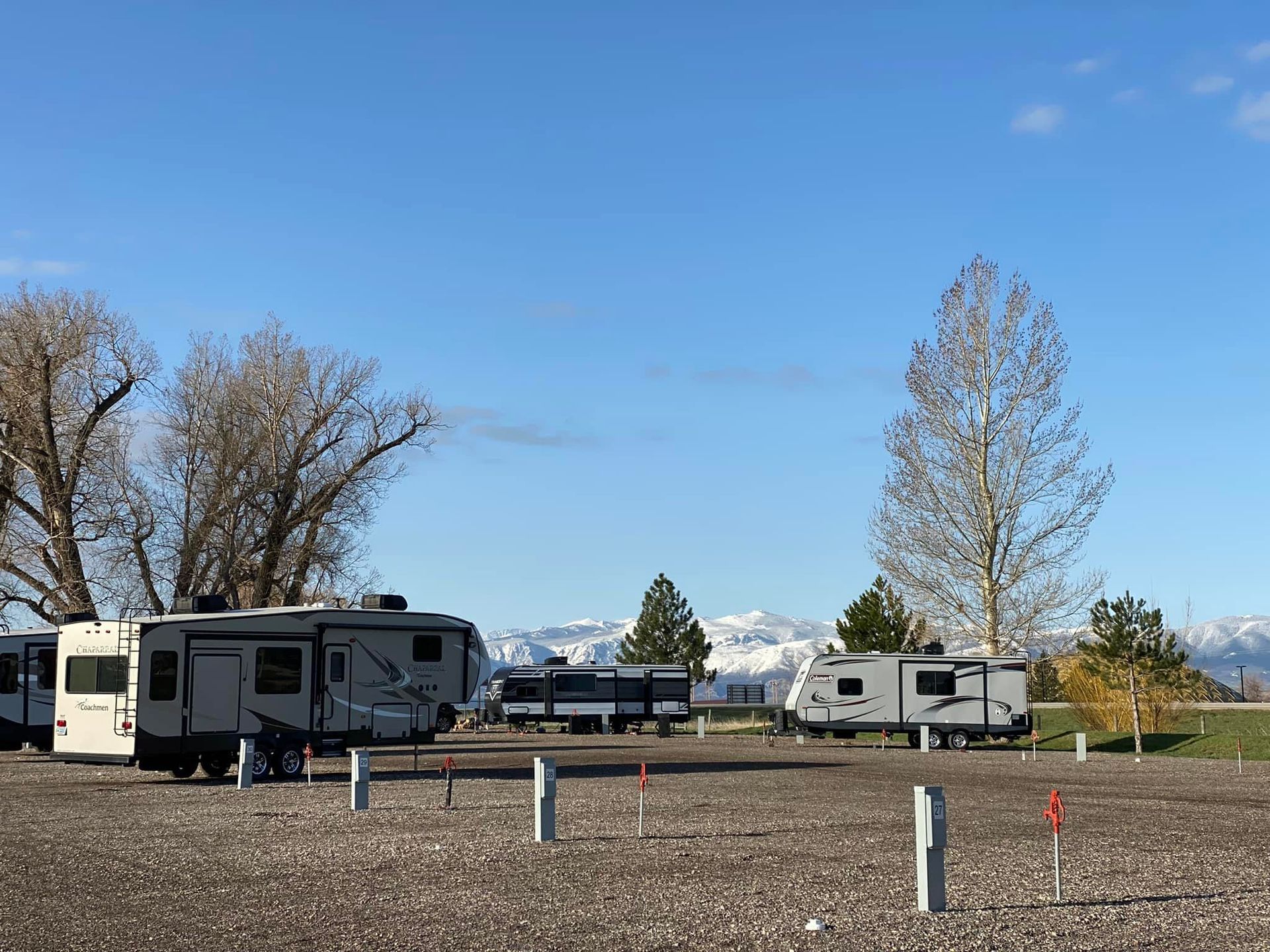 rv sites with snow capped mountains in the background