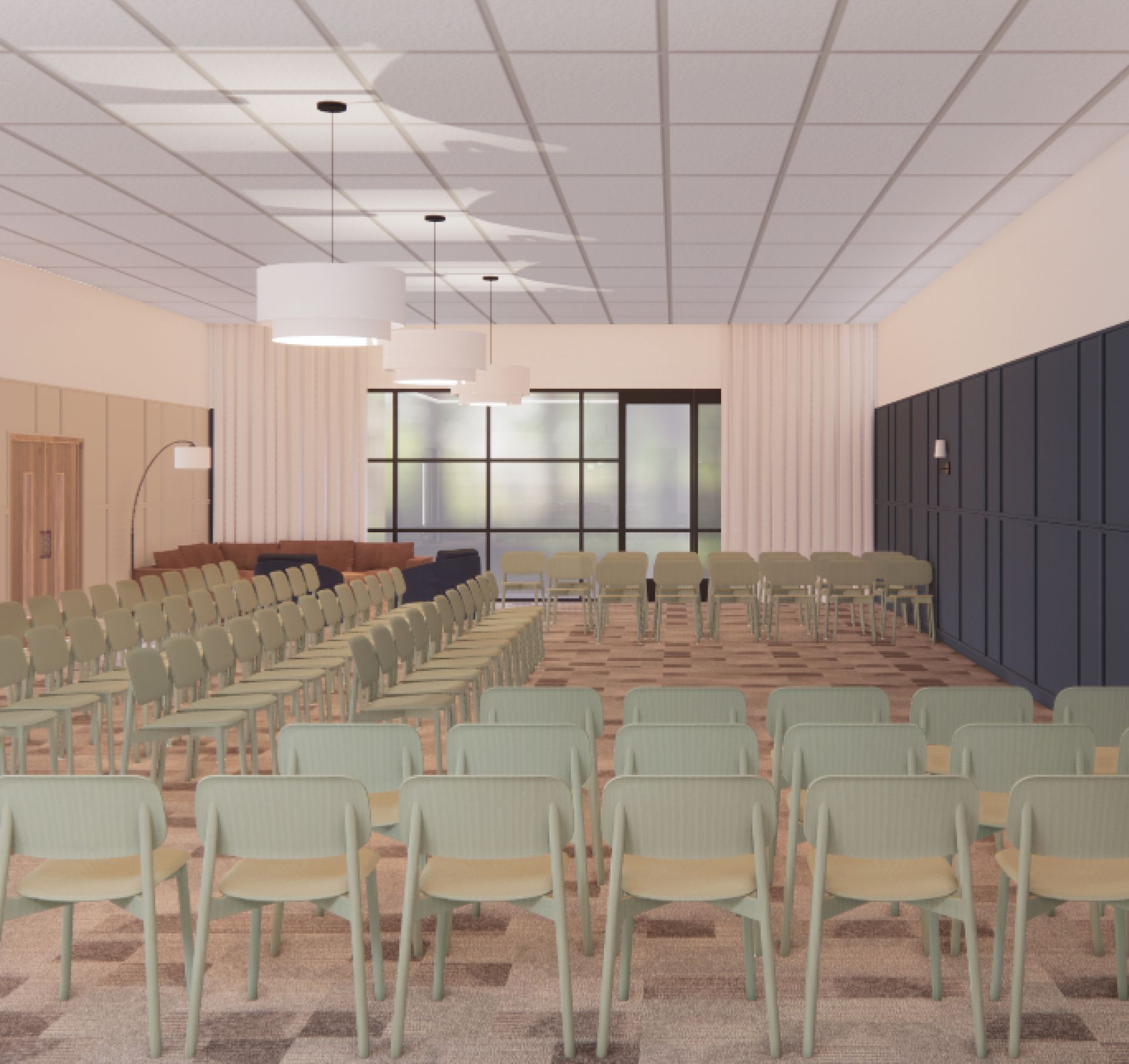 A large room with rows of chairs and tables