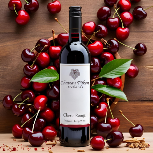 A bottle of cherie rouge wine is surrounded by cherries