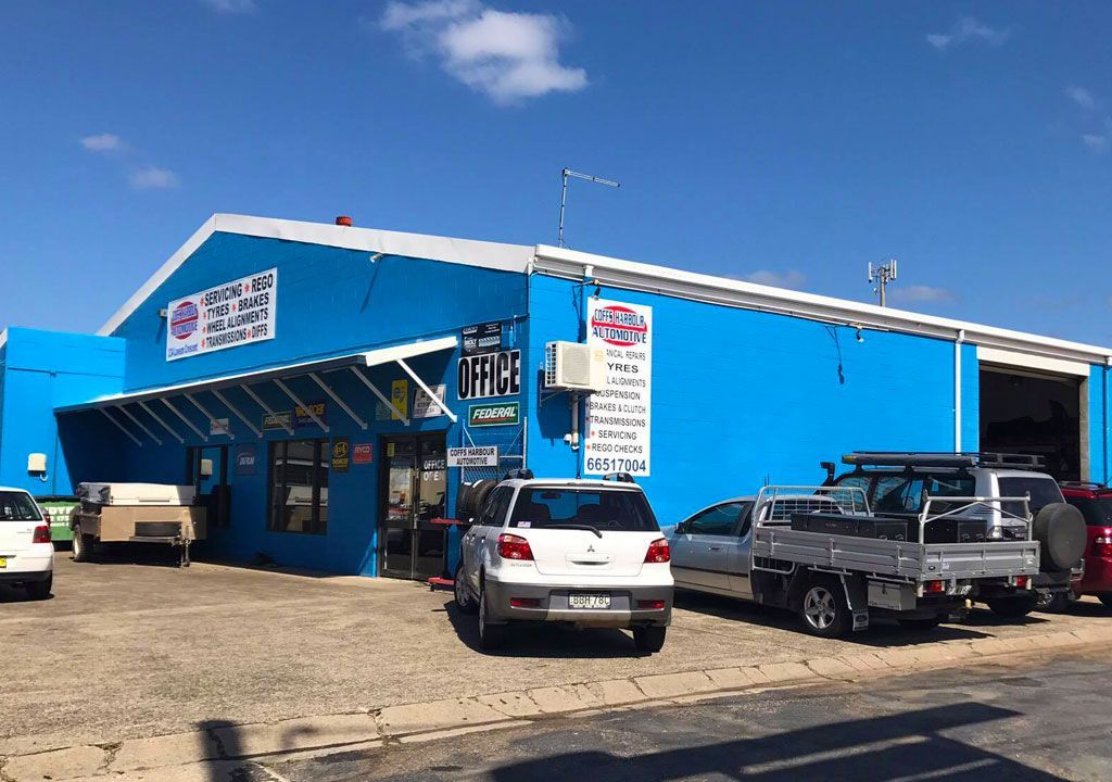 A Blue Building With Cars Parked In Front Of It  β Coffs Harbour Automotive In Coffs Harbour, NSW