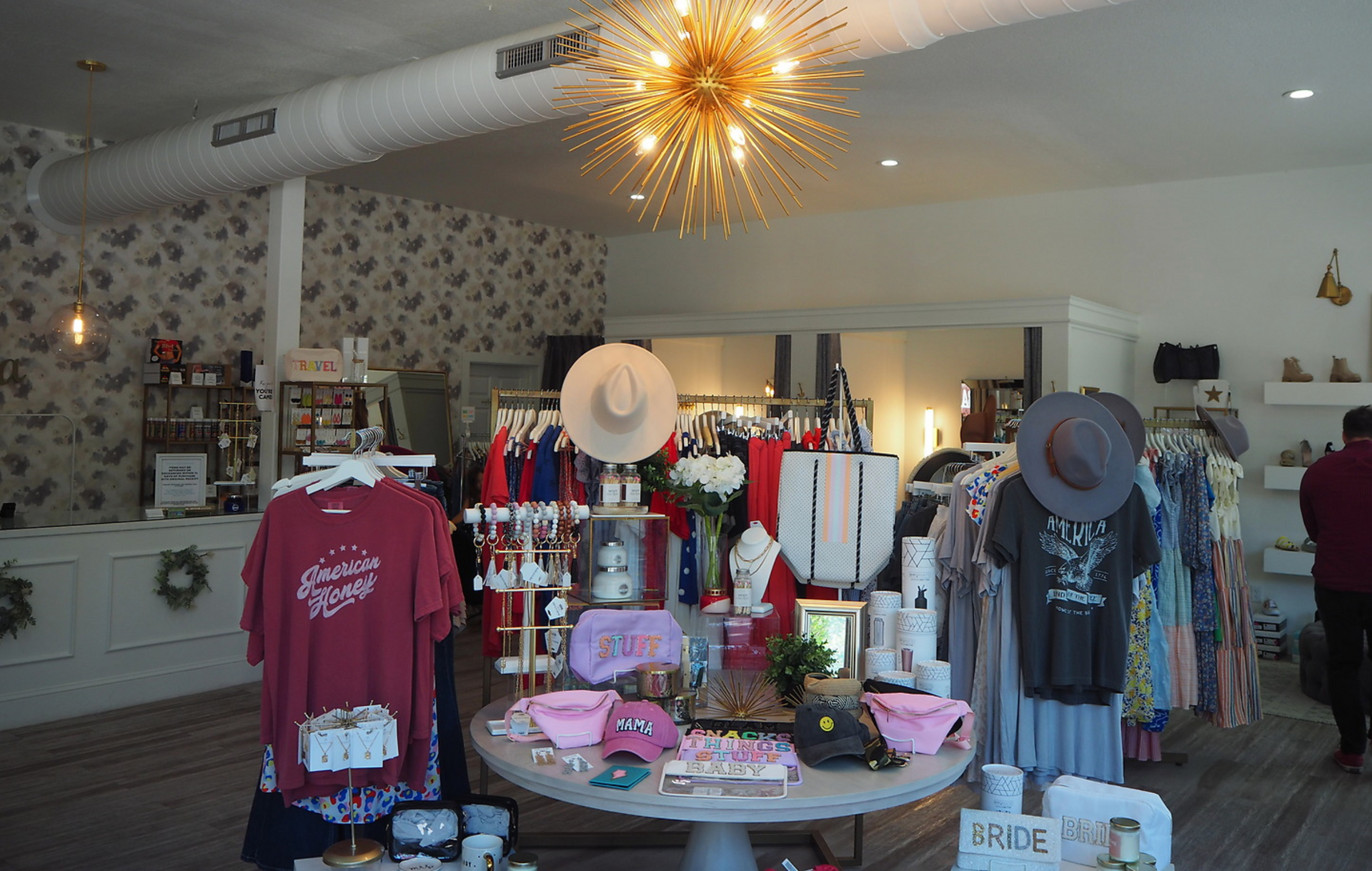 A store filled with lots of clothes and hats.