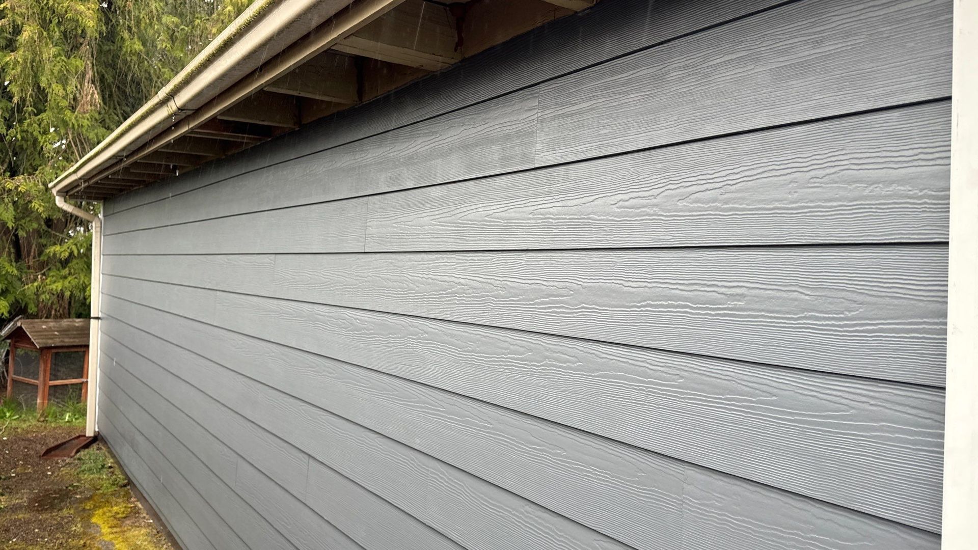 Close-up of weather-resistant vinyl siding on a house in Eugene, Oregon.