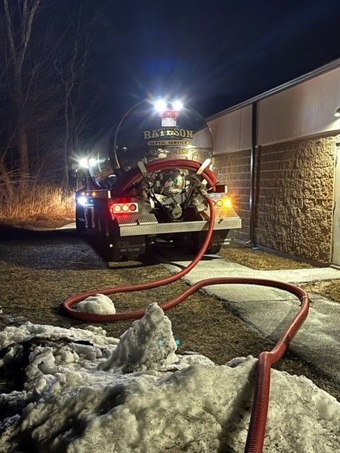 Man Holding To The Septic Pipe — Andover, MA — Bateson Enterprises