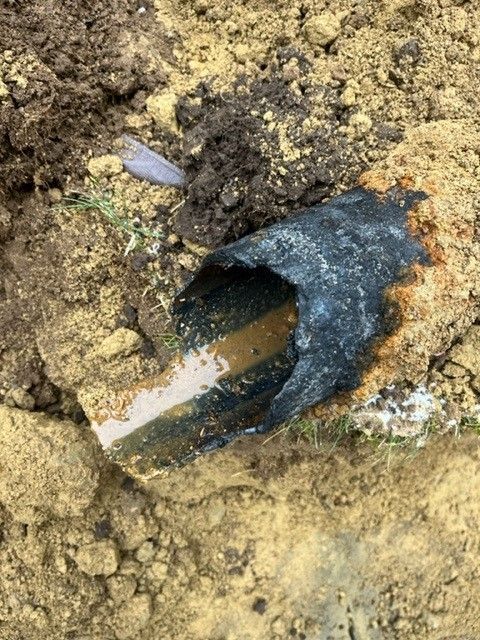 Man Checking The Septic — Andover, MA — Bateson Enterprises