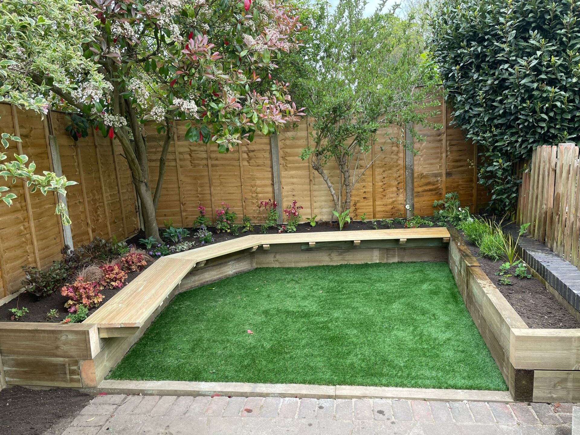 Flowerbeds and landscaped garden in Surrey