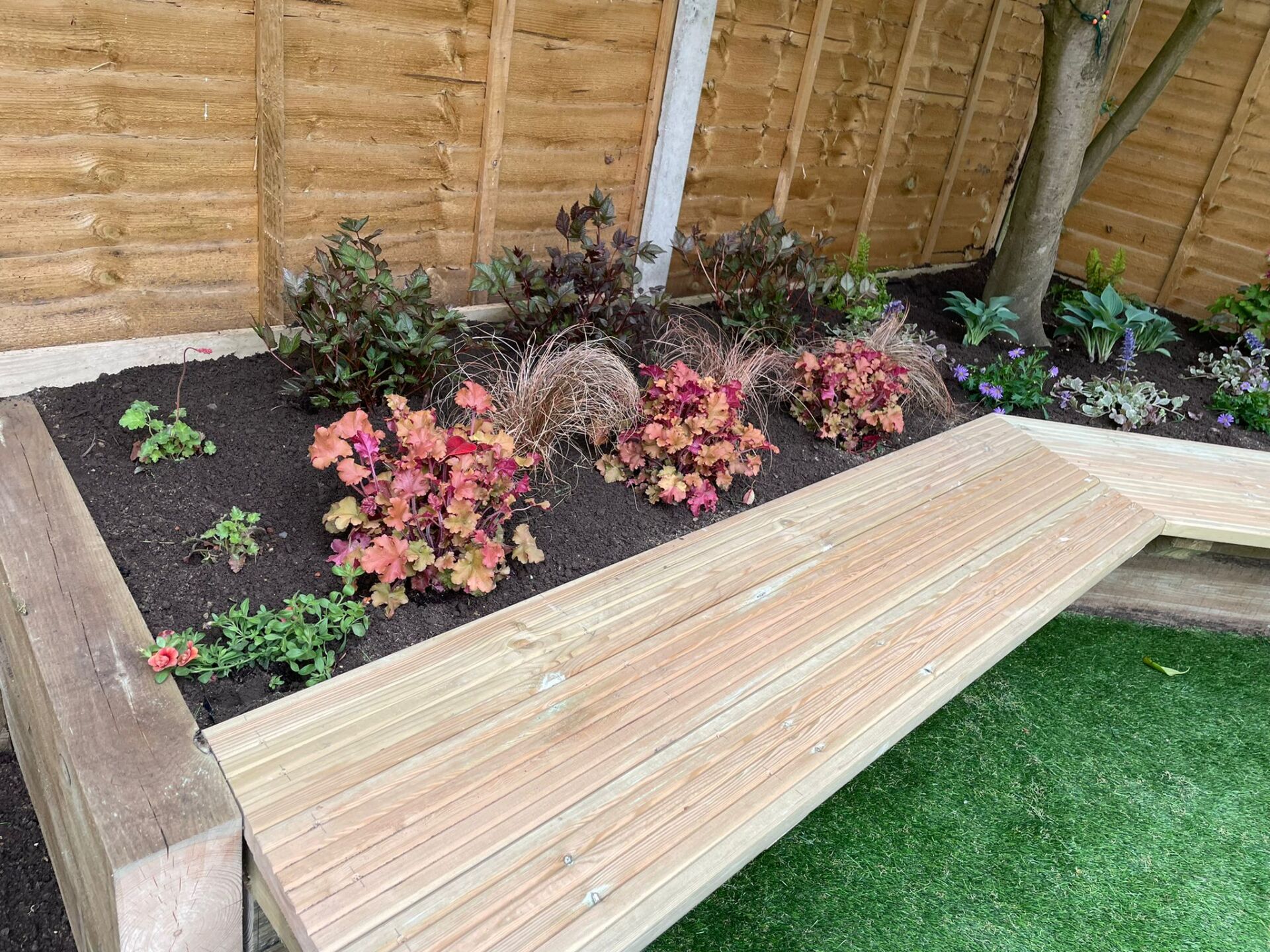 Flowerbed in designed garden