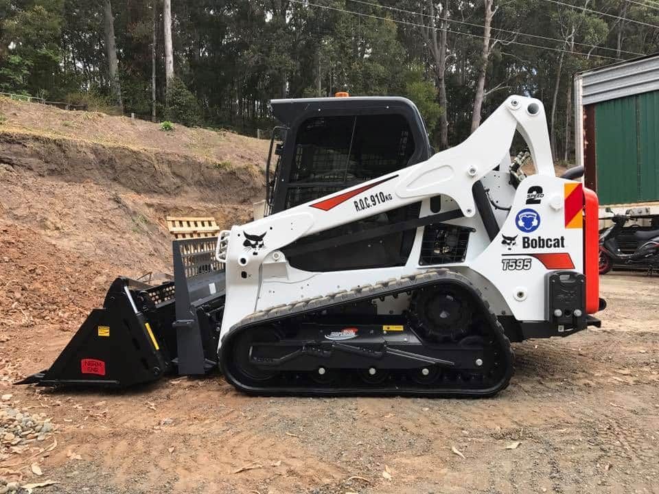 A Bobcat Track Loader is Parked in a Dirt Lot — BeCivil in Bomaderry, NSW