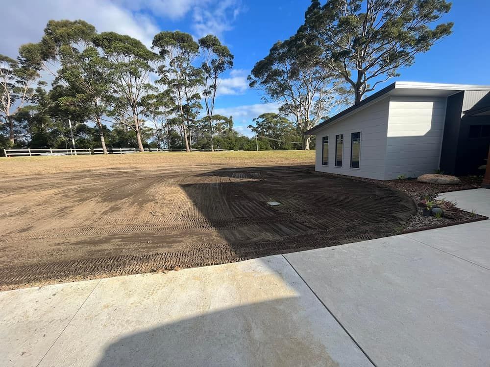 A White House is Sitting in the Middle of a Dirt Field — BeCivil in Tomerong, NSW