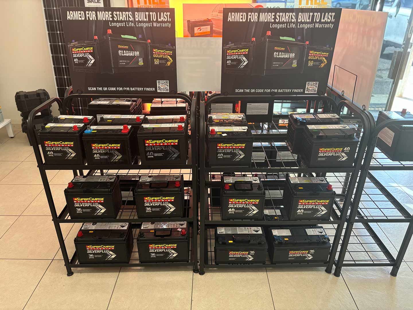 A Display Of Batteries On Shelves In A Store — Coast 2 Coast Batteries in Terrigal, NSW