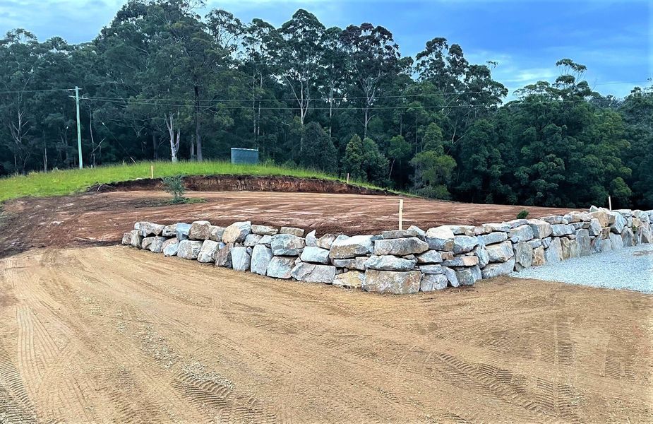 A Pile Of Rocks Is Sitting On Top Of A Dirt Field — Blue Dog Landscape Supplies In Newee Creek, NSW