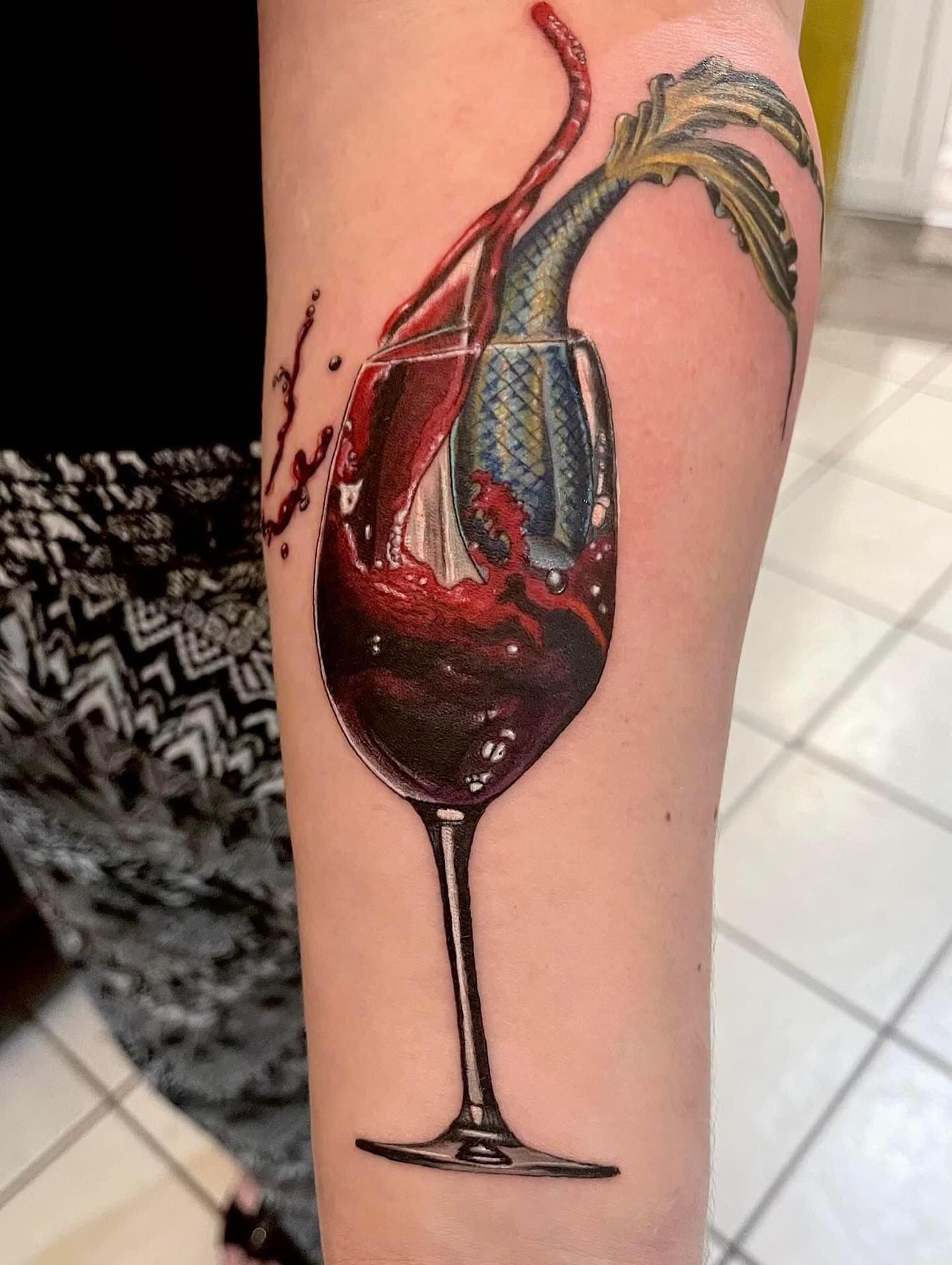 Wine Tattoo by Sly at Silver Ghost Tattoo in Edmonton Alberta Canada