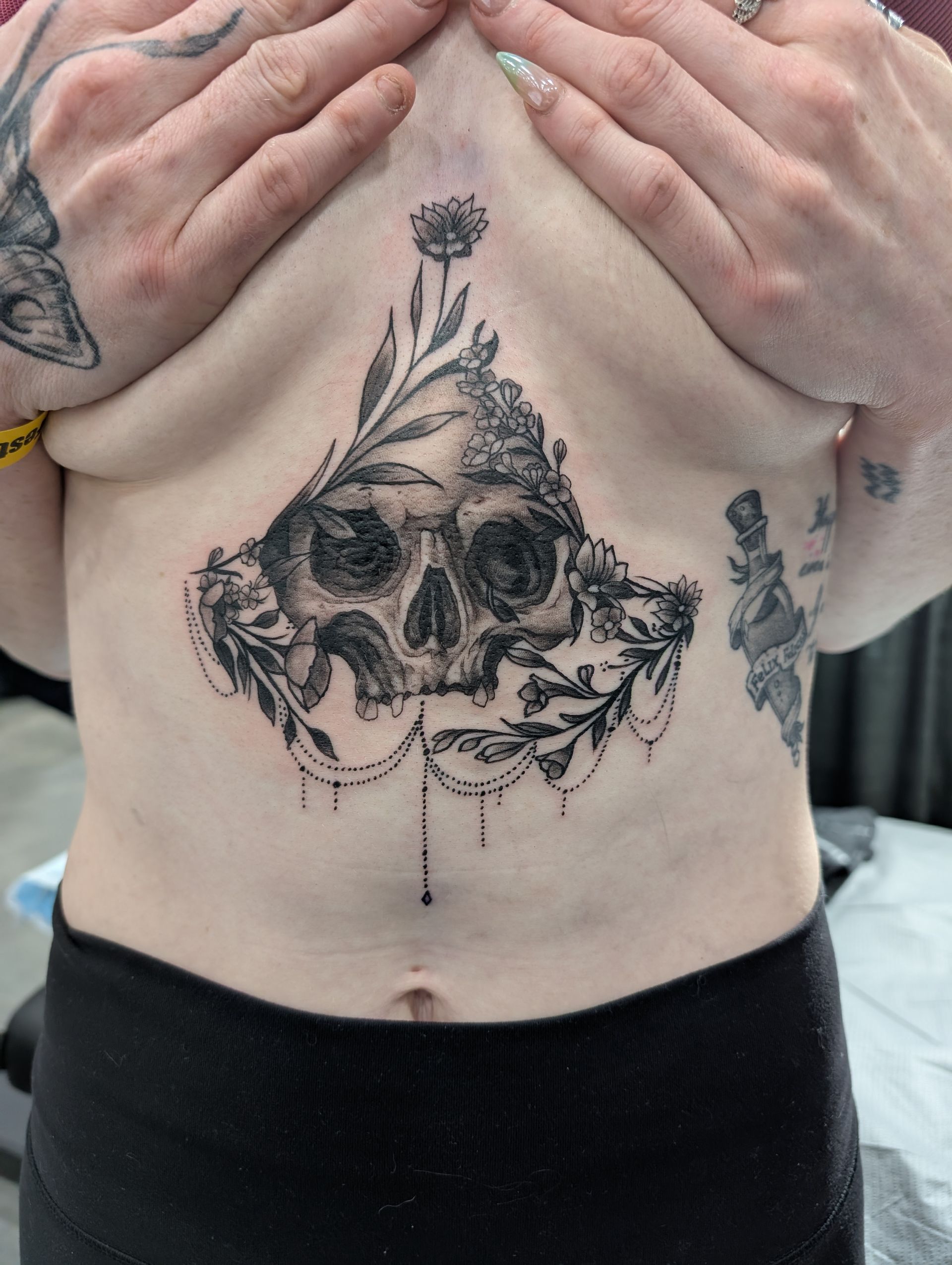 Skull and Floral Tattoo by Kevin Sherritt at Black Gold Tattoo Co in Edmonton Alberta Canada