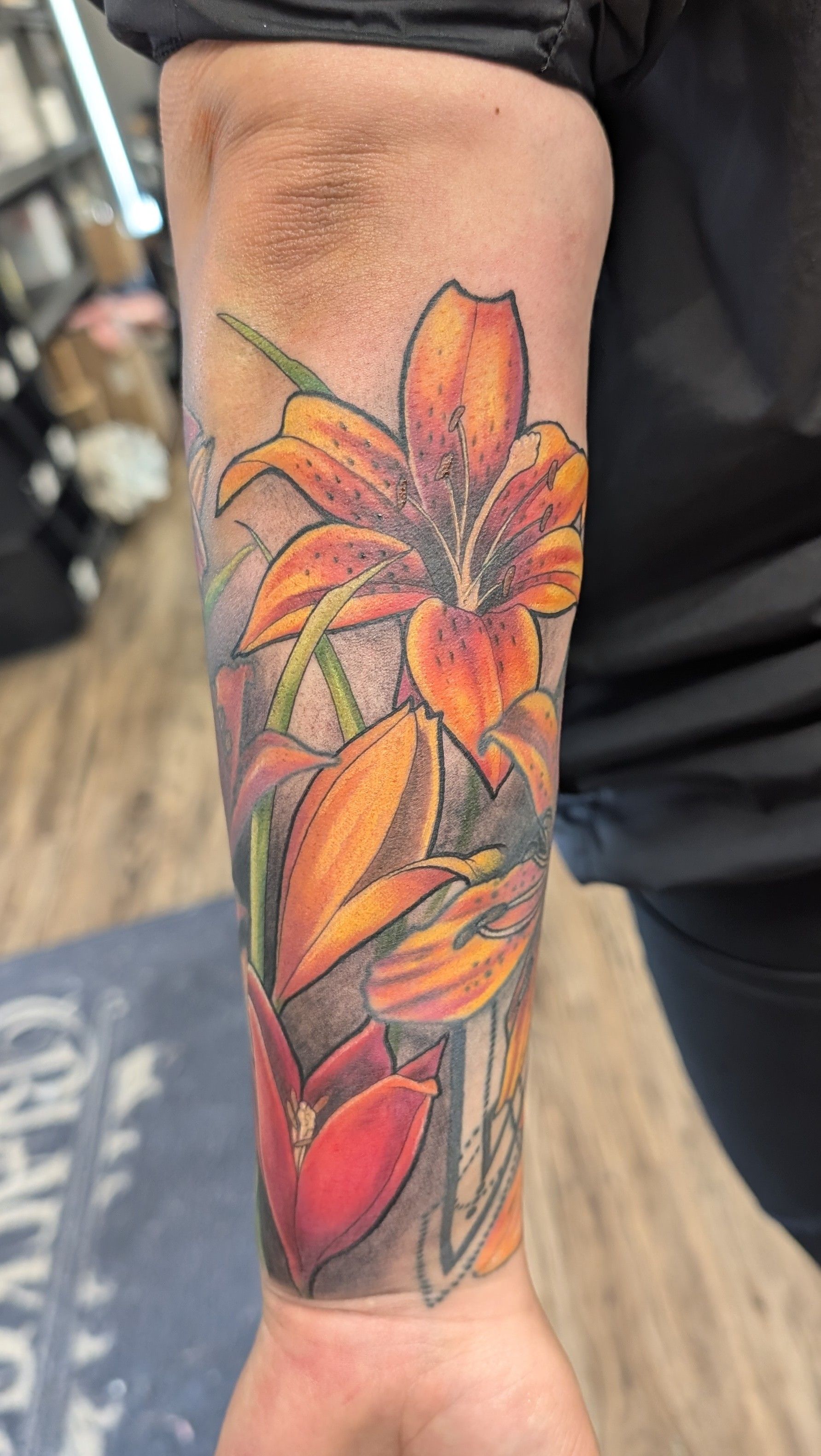Lillies Tattoo by Kevin Sherritt at Black Gold Tattoo Co in Edmonton Alberta Canada