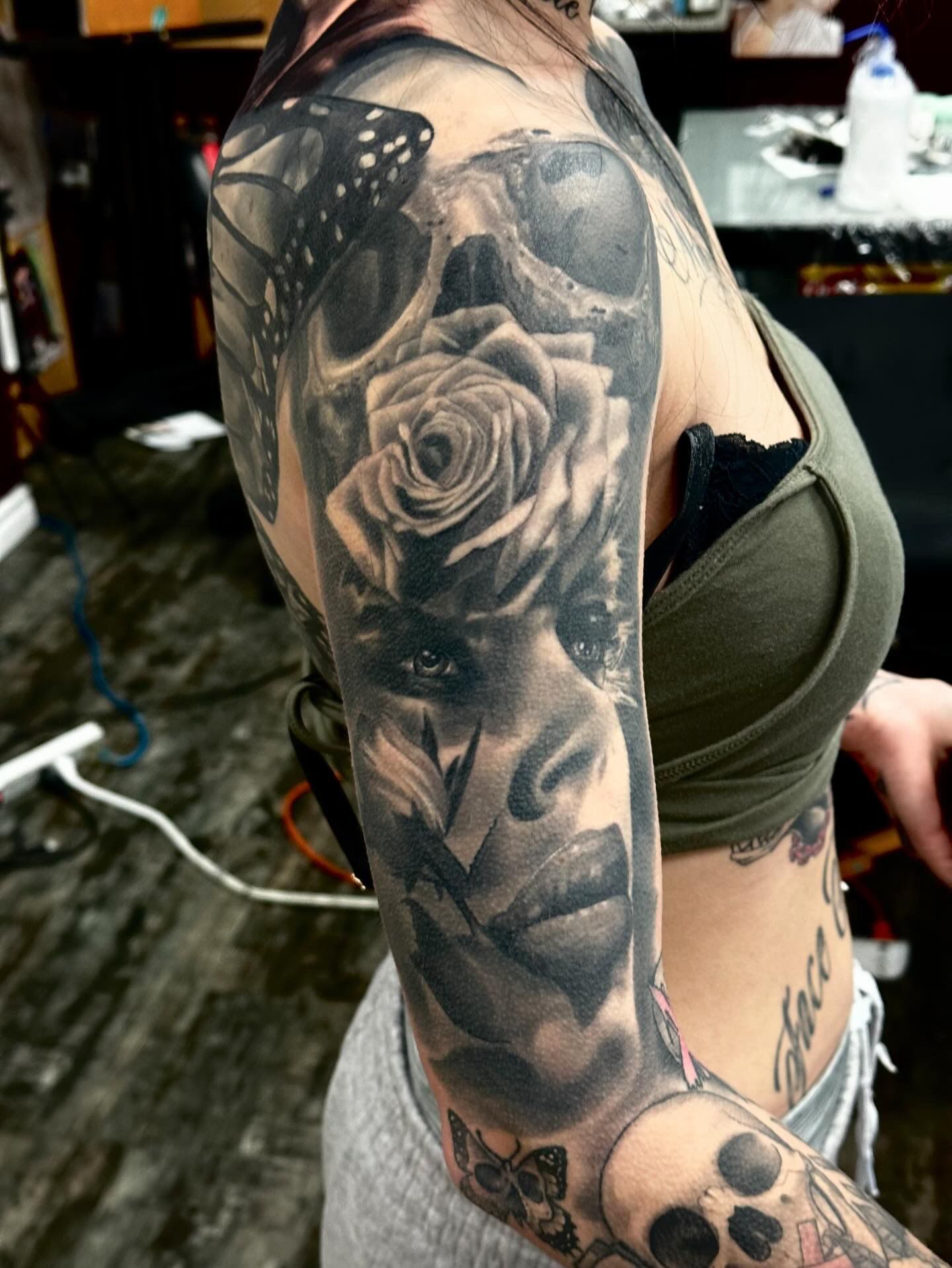 Skull, Rose and Woman Portrait Tattoo by Sly at Silver Ghost Tattoo in Edmonton Alberta Canada