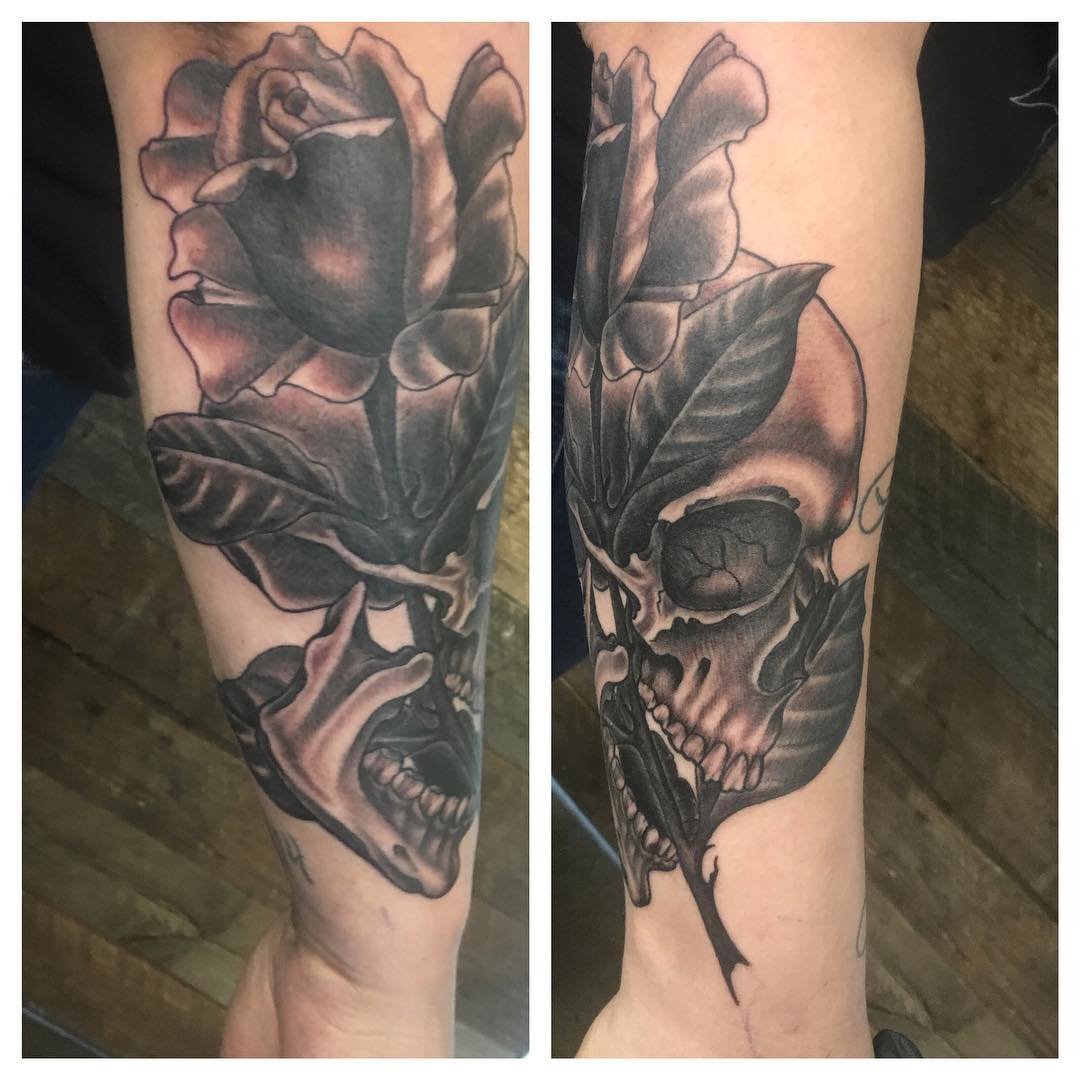 Skull and Floral Tattoo by Dale Moostoos at Crimson Empire Tattoo in Edmonton Alberta Canada