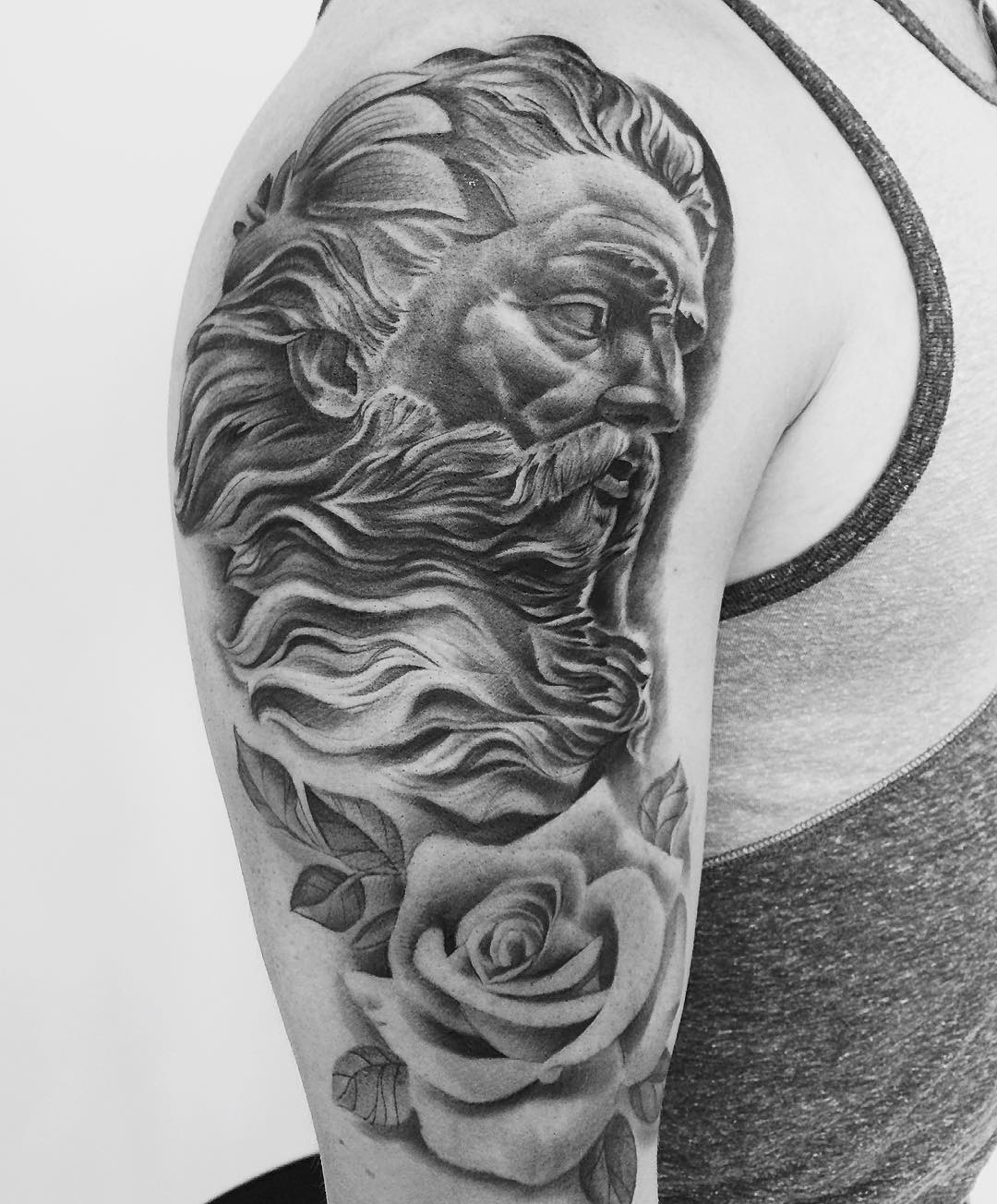 Zeus and Rose Tattoo by Chad Lavers at Crimson Empire Tattoo in Edmonton Alberta Canada