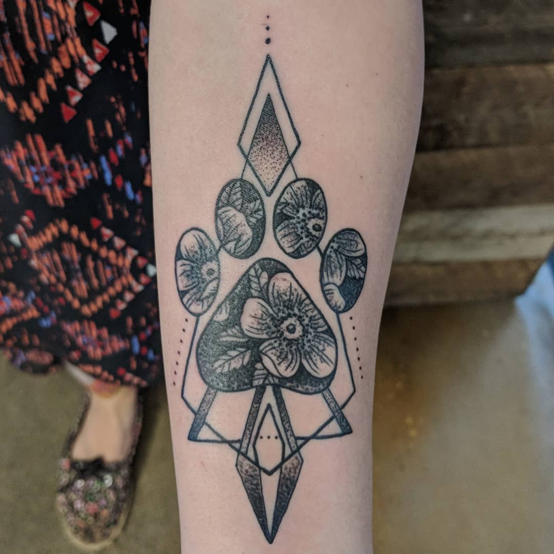 Paw Print and Floral Tattoo by Sheila Anderson at Crimson Empire Tattoo in Edmonton Alberta Canada