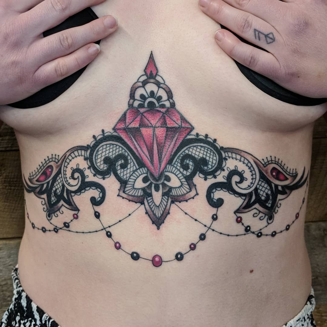 Ornamental Sternum Tattoo by Sheila Anderson at Crimson Empire Tattoo in Edmonton Alberta Canada