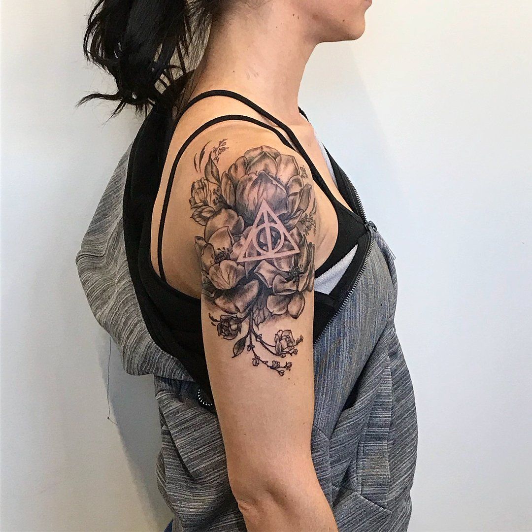 Floral and Deathly Hallows Harry Potter Tattoo by Amber Strange at Black Gold Tattoo Co in Edmonton Alberta Canada