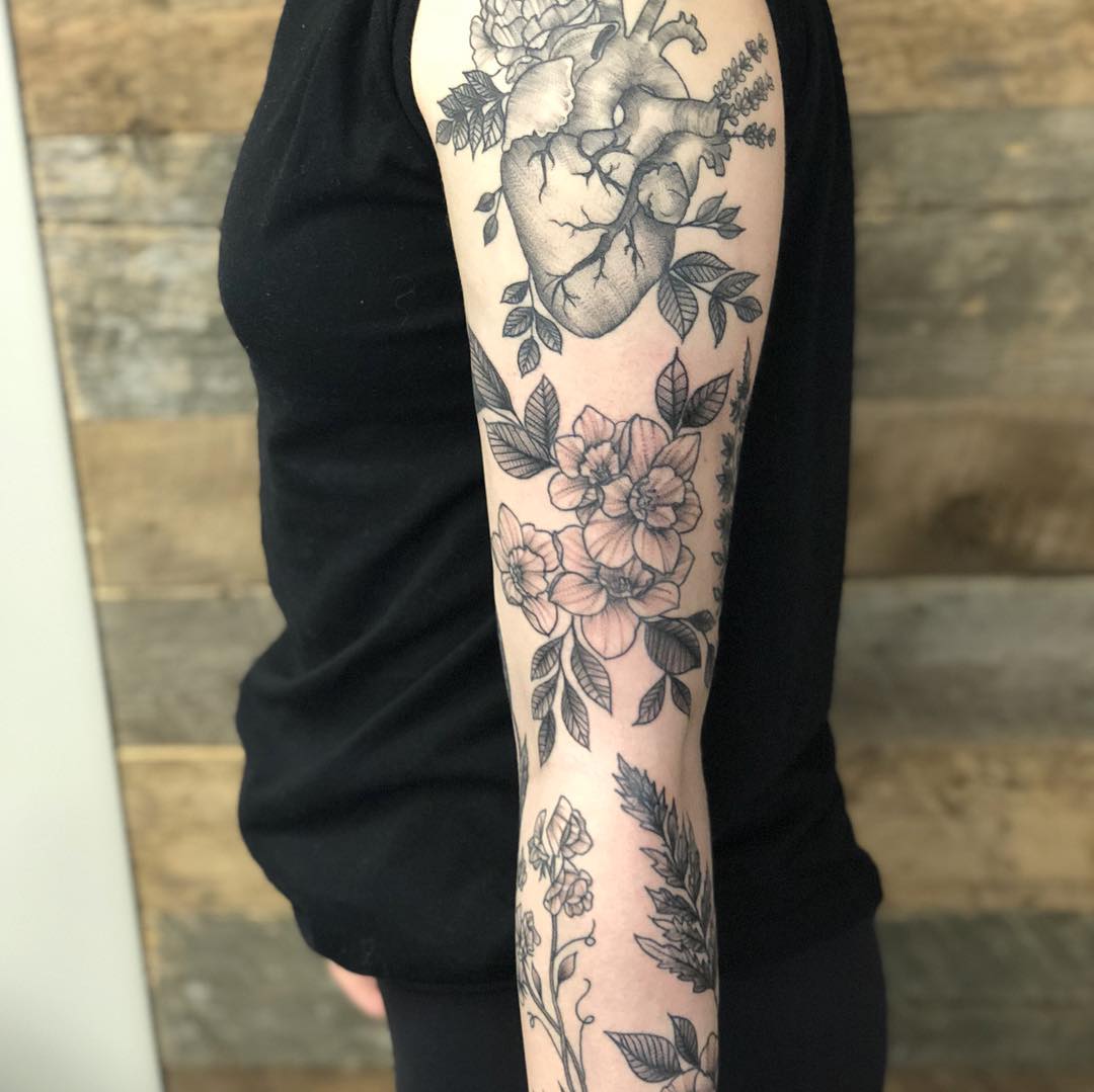 Anatomical Heart and Floral Sleeve by Vanessa Spezowka at Crimson Empire Tattoo in Edmonton Alberta Canada