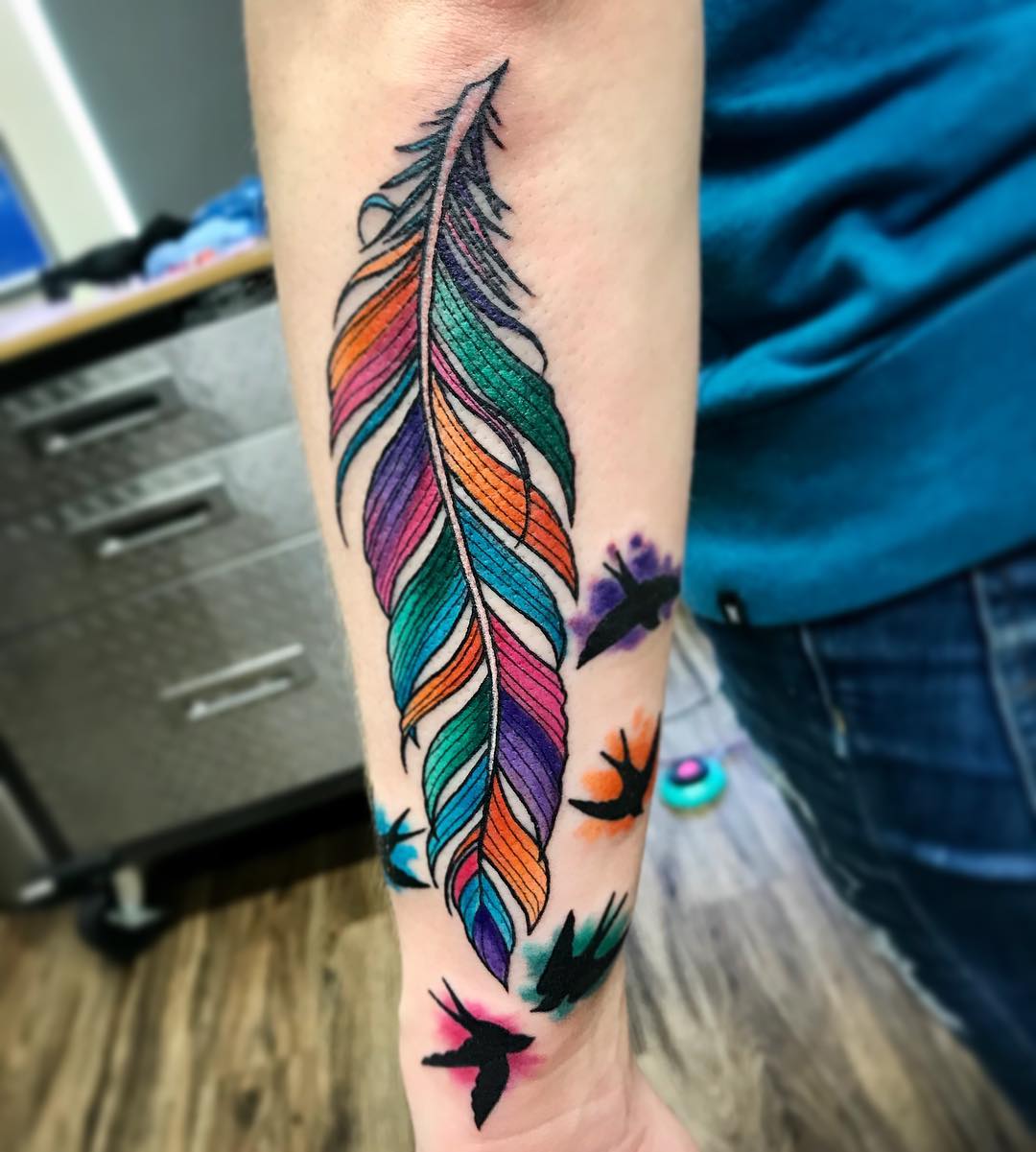 Colorful Feather Tattoo by Jess Alther at Black Gold Tattoo Co in Edmonton Alberta Canada