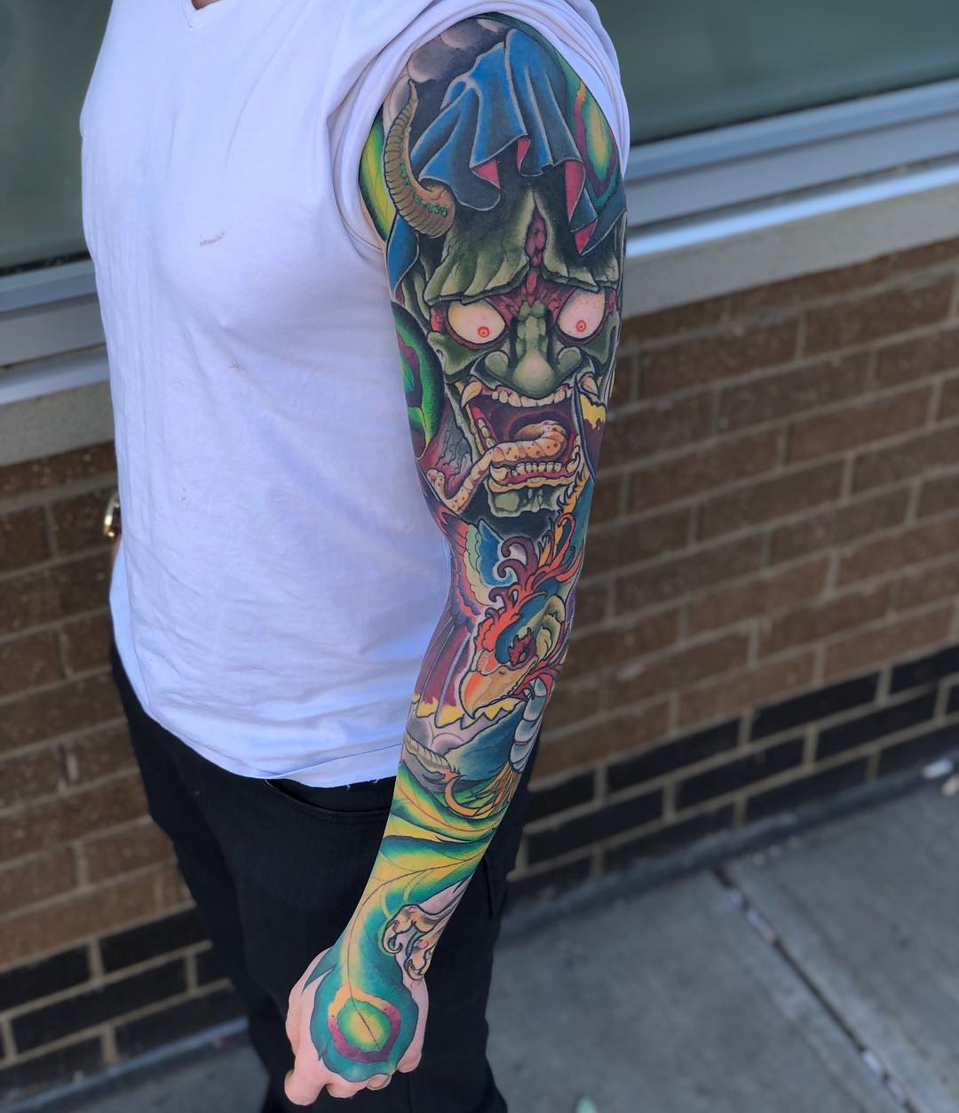 Hannya Mask and Peacock Tattoo by Curt Semeniuk at Crimson Empire Tattoo in Edmonton Alberta Canada