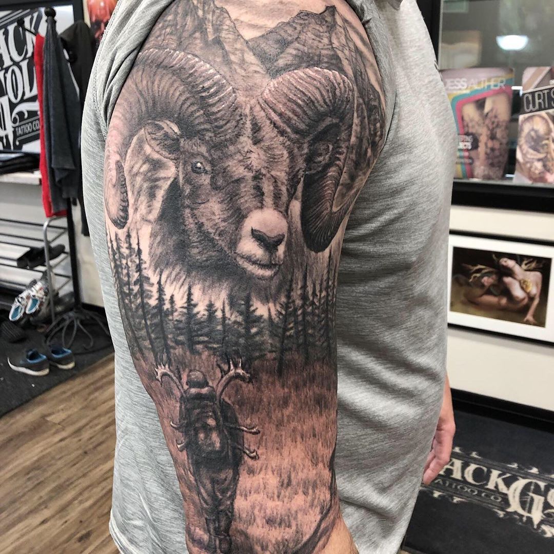 Ram and Hunter Wilderness Tattoo by Steve Hayes at Black Gold Tattoo Co in Edmonton Alberta Canada
