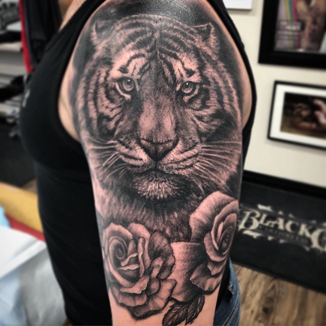Tiger and Roses Tattoo by Steve Hayes at Black Gold Tattoo Co in Edmonton Alberta Canada