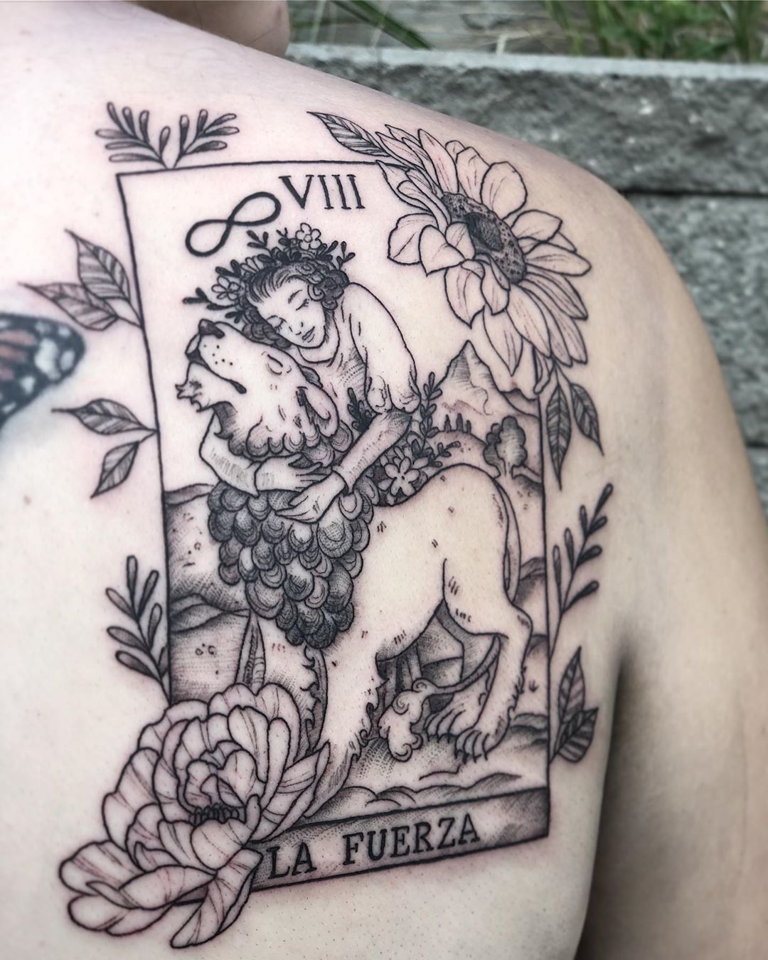 Strength Tarot Card Tattoo by Vanessa Spezowka at Crimson Empire Tattoo in Edmonton Alberta Canada