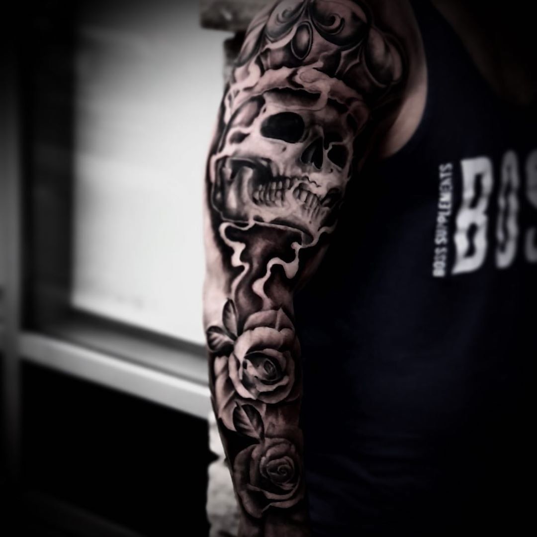 Skull and Roses Tattoo by Romeo Ostiguy at Black Gold Tattoo Co in Edmonton Alberta Canada