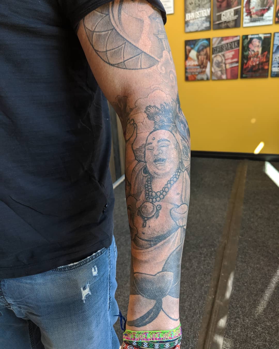 Laughing Buddha Tattoo by Kevin Sherritt at Black Gold Tattoo Co in Edmonton Alberta Canada