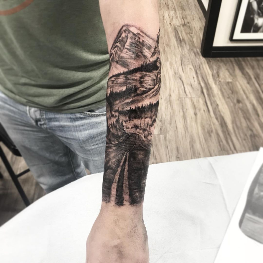 Mountain Road Scenery Tattoo by Amber Strange at Black Gold Tattoo Co in Edmonton Alberta Canada
