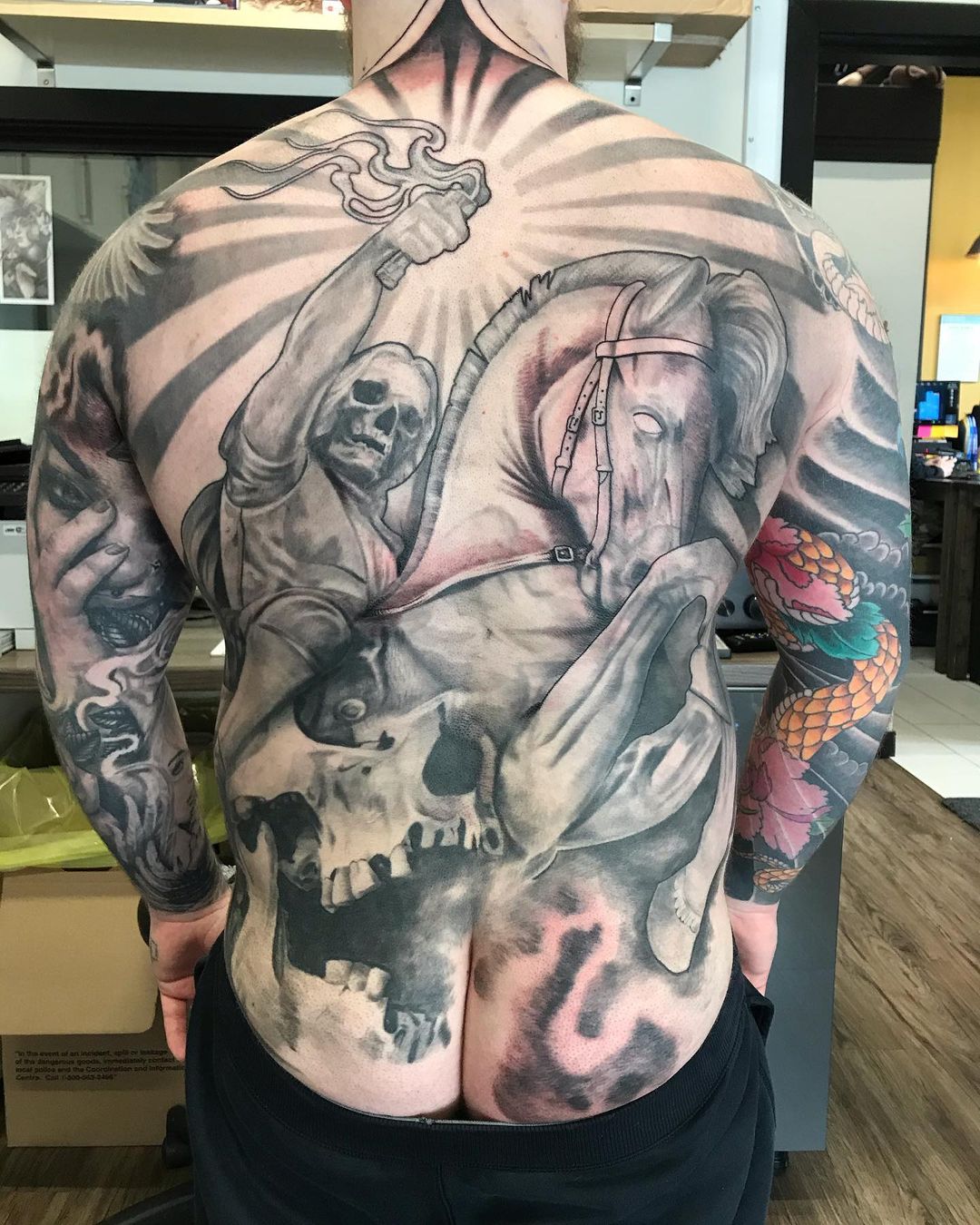 Horseman of the Apocalypse Back Piece by Alan Coates at Black Gold Tattoo Co in Edmonton Alberta Canada