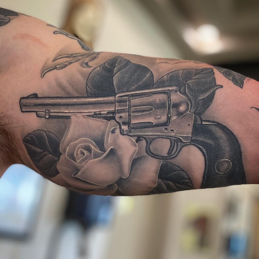 Rose and Revolver Tattoo by Dale Moostoos at Crimson Empire Tattoo in Edmonton Alberta Canada
