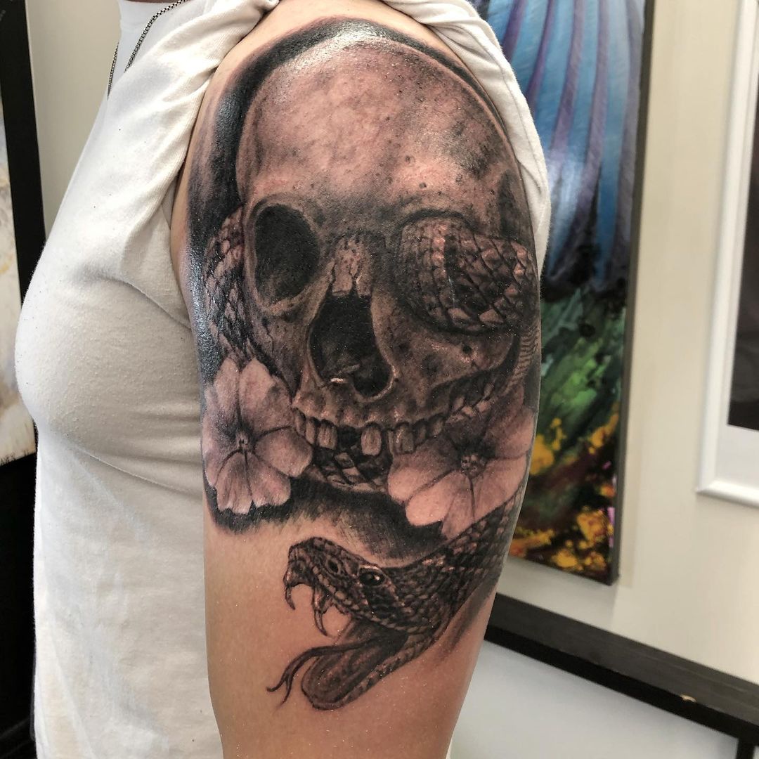 Snake and Skull Tattoo by Steve Hayes at Black Gold Tattoo Co in Edmonton Alberta Canada