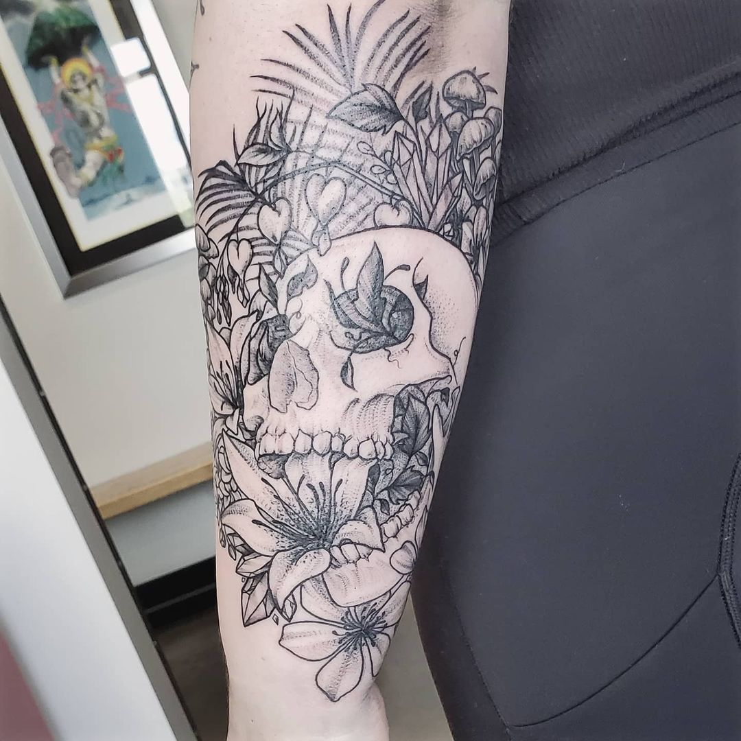 Skull and Floral Tattoo by Adrienne Alexander at Crimson Empire Tattoo in Edmonton Alberta Canada
