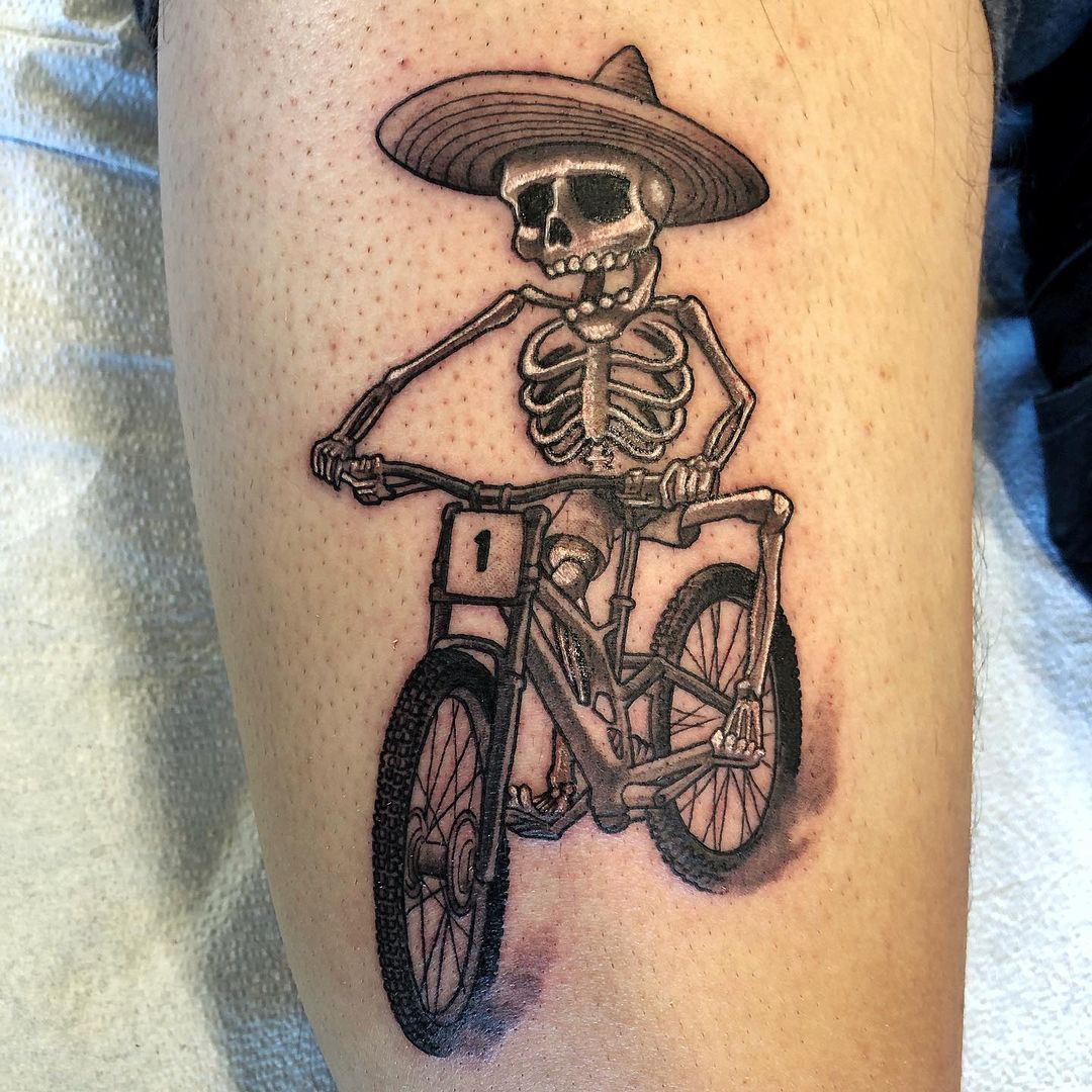Skeleton on Bicycle Tattoo by Chad Lavers at Crimson Empire Tattoo in Edmonton Alberta Canada