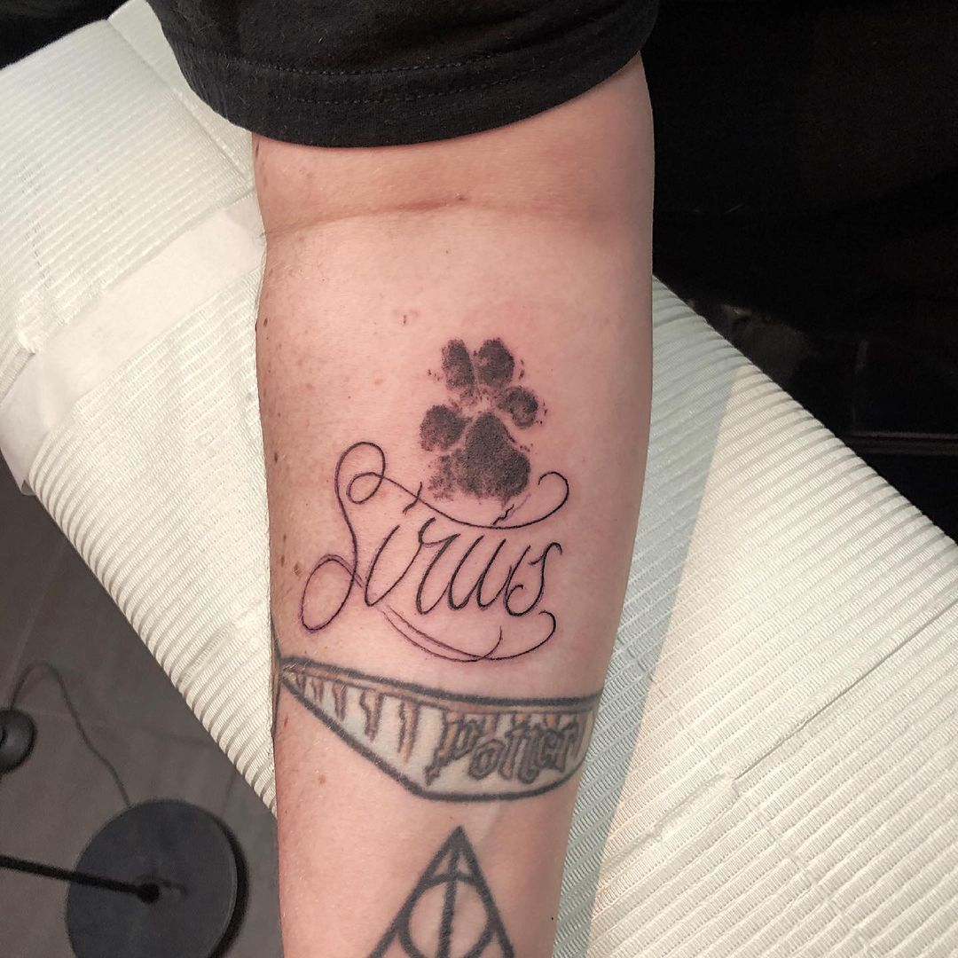 Paw Print and Script Tattoo by Tony Honning at Crimson Empire Tattoo in Edmonton Alberta Canada