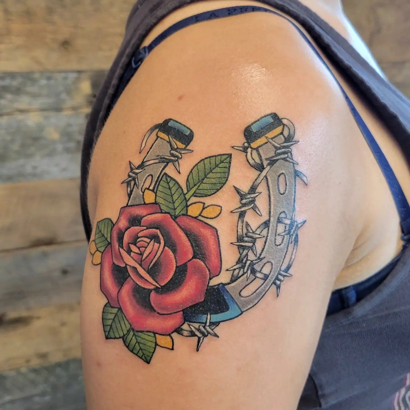 Rose and Horseshoe Tattoo by Sheila Anderson at Crimson Empire Tattoo in Edmonton Alberta Canada