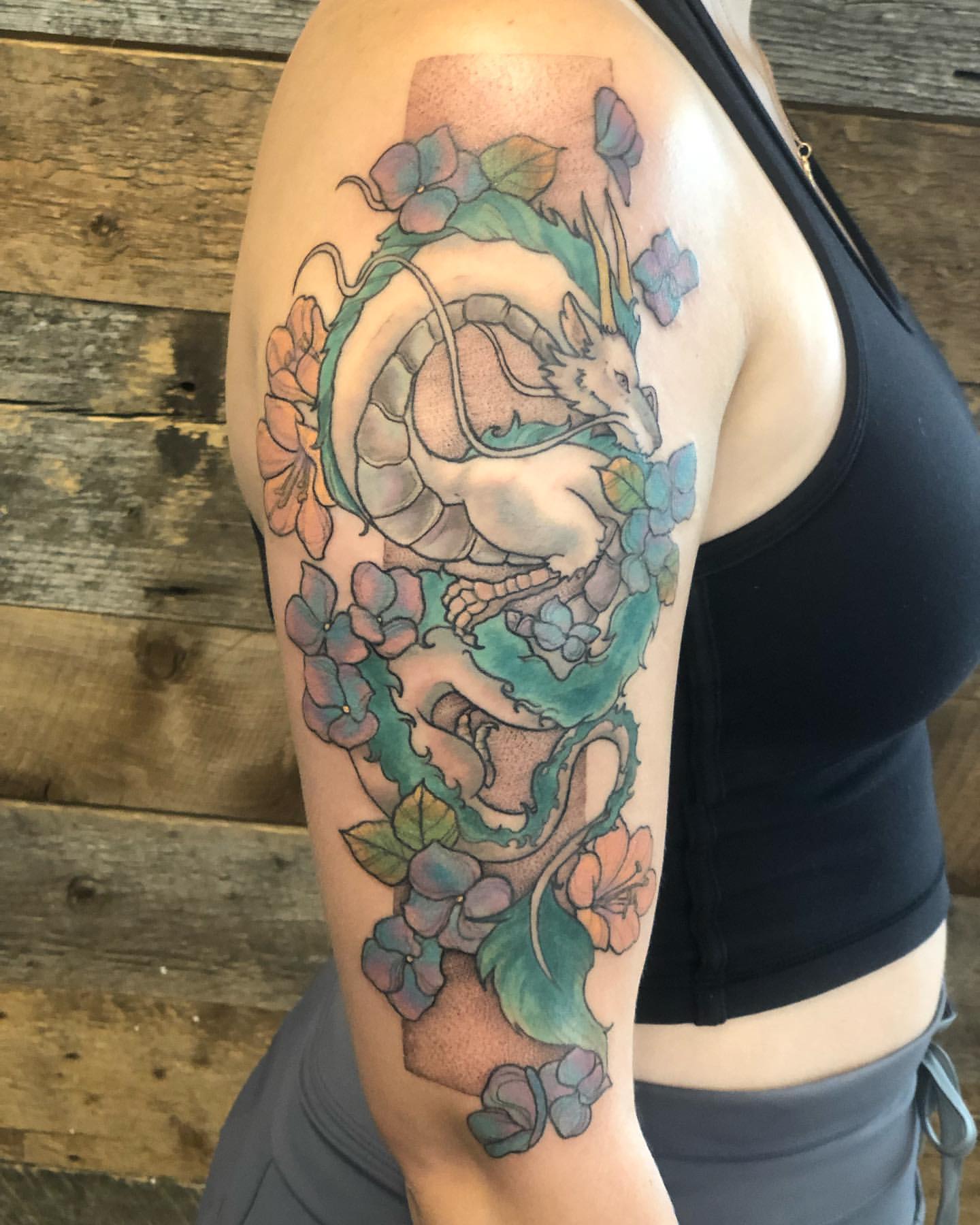 Dragon Tattoo by Vanessa Spezowka at Crimson Empire Tattoo in Edmonton Alberta Canada