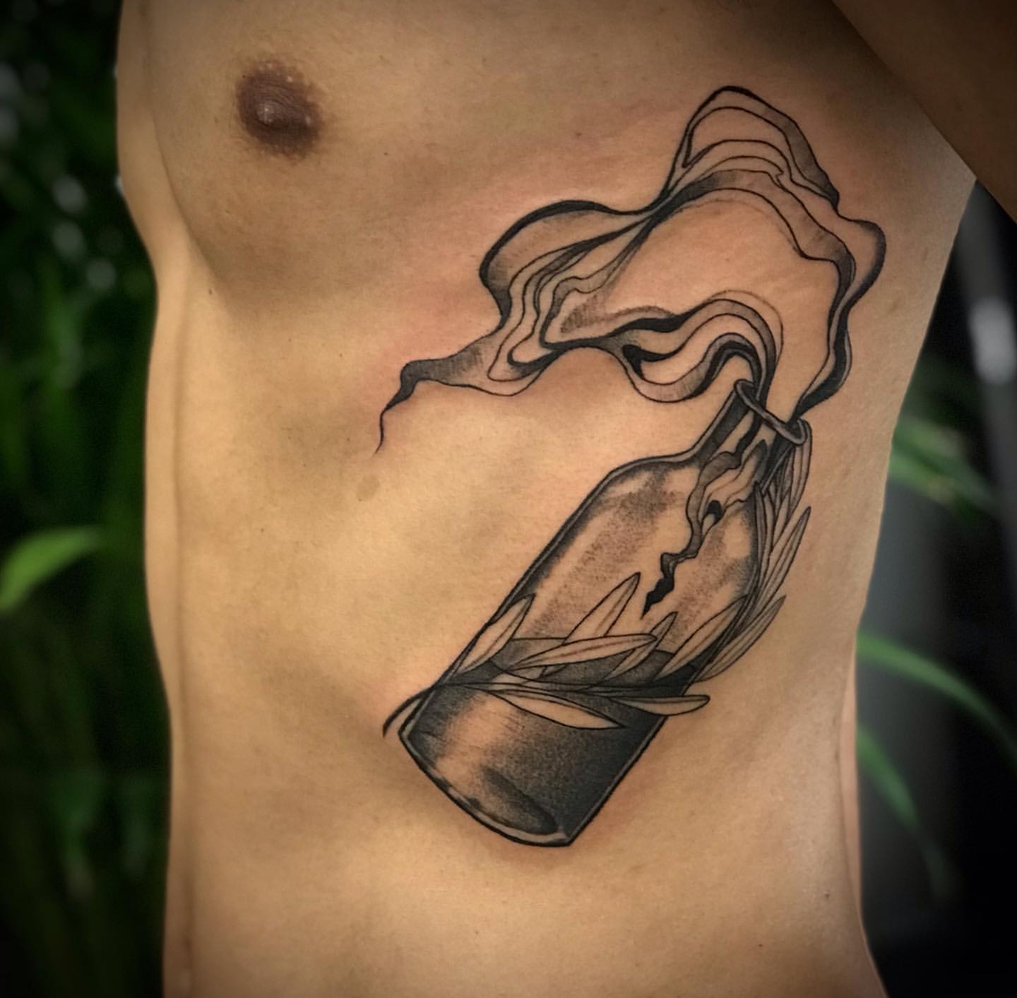 Molotov Tattoo by Anastasiya at Silver Ghost Tattoo in Edmonton Alberta Canada